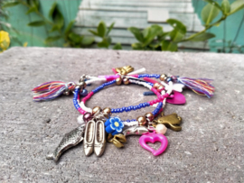 Wikkelarmband in fuchsia/lavendel en wit met gouden accenten