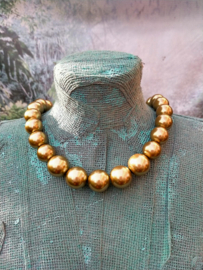 Korte grove glasparel ketting in goudkleur