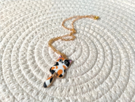 Goudkleurig kinderkettinkje met lapjespoes hanger