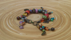 Workshop armband met knoopsluiting €35,-