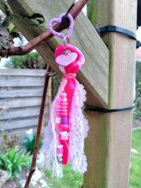 Roze en lila tashanger