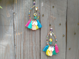 Oorbellen Ibiza style met kauri schelpjes en evel eye kralen