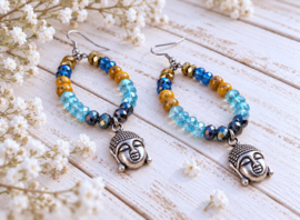 Buddha Oorbellen in Turquoise en Oranje