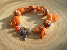 Kinderworkshop geregen armbandje met bedels €10,-