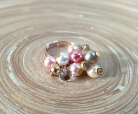 Extra volle glasparel ring in goud en roze tinten. Verstelbaar