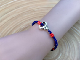 Skull armbandje in donkerblauw en oranje