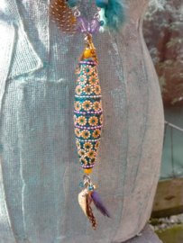 Lange ibiza style ketting met een grote chamballa strass kraal