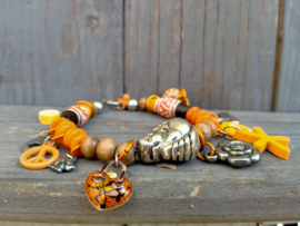 Oranje houten armband in buddha style