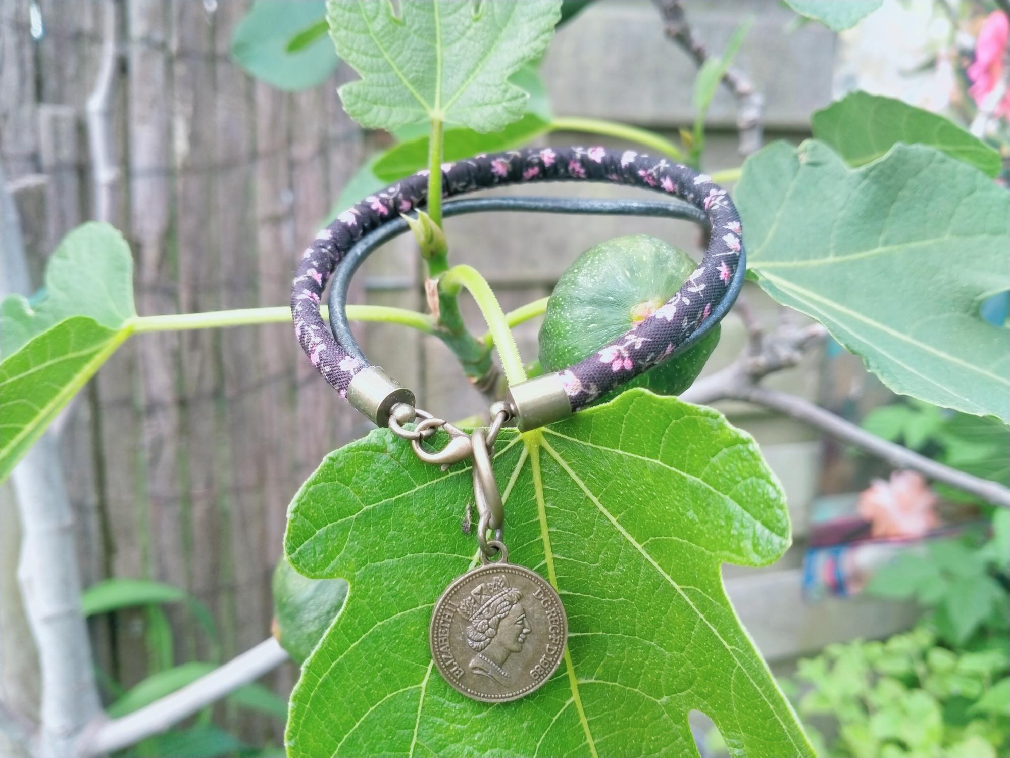 Zwarte en roze heren armband in brons