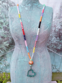 Lange Bohemian ketting met turquoise harthanger