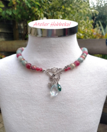 Vlinder ketting van watermeloen en zachtgroene glasparels