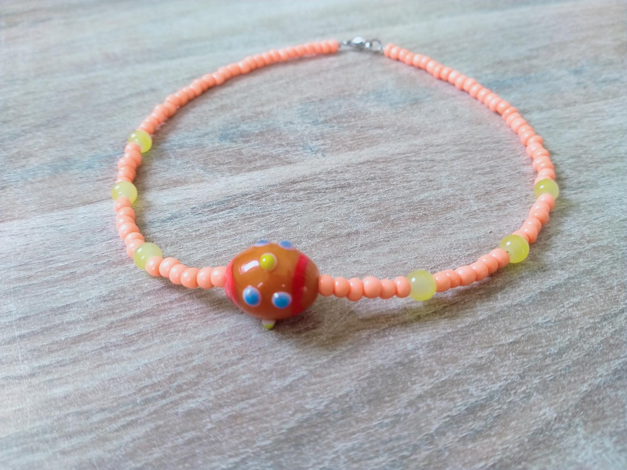 Oranje Choker met gele glaskraaltjes