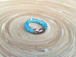 Turquoise/bronskleurige ring op elastiek