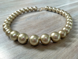 Korte grove glasparel ketting in goudkleur