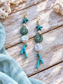 Turquoise Ibiza Oorbellen met witte Details