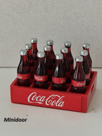 Kratje met Cola flesjes