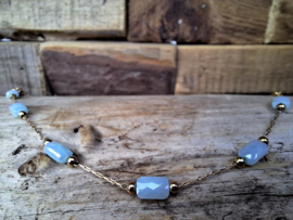 Stainless steel armband ovale glaskralen licht blauw