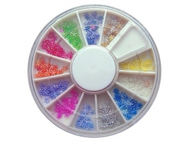 Iridescent nailart in wheel box, blossom