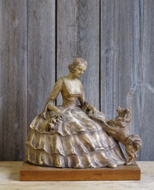 statue lady with dog