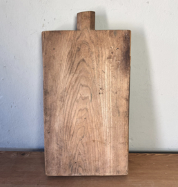 Antique hand-carved wooden board with star motif