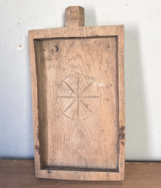 Antique hand-carved wooden board with star motif