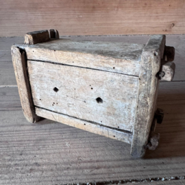 Antique wooden mini cheese mold with hand-carved rosettes