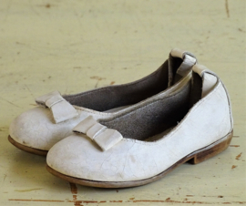 Antique leather children's shoes with bow