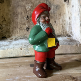 Old Swedish gnome with a lantern