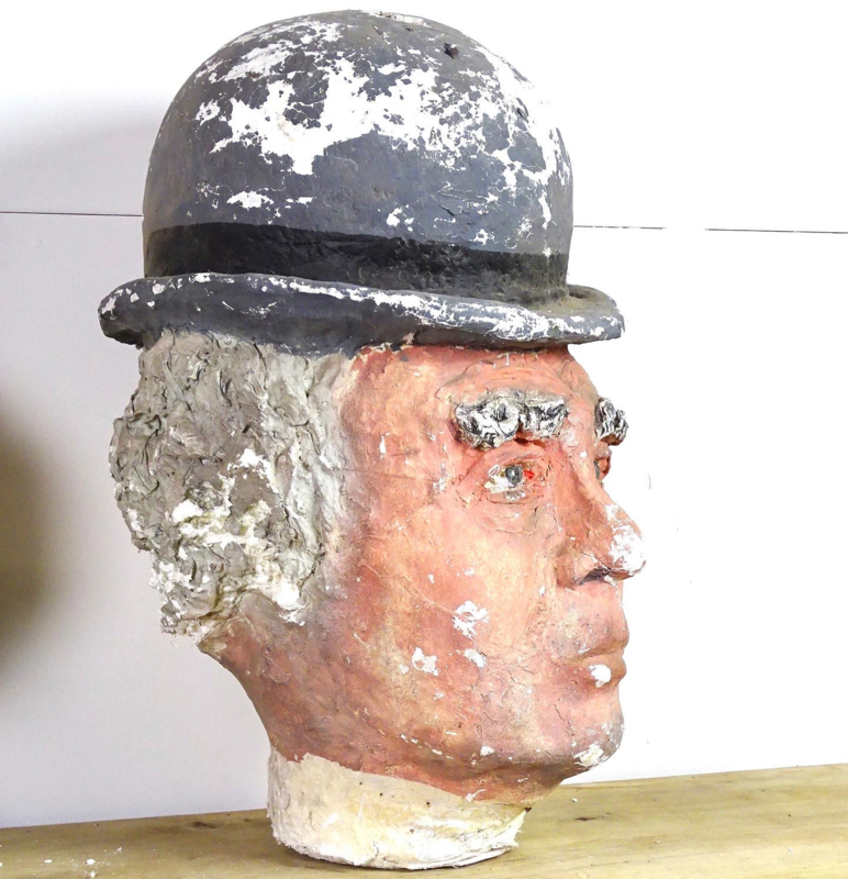 Head with bowler hat