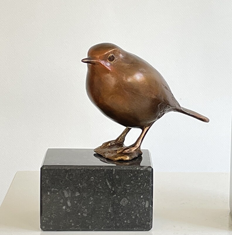 Bronzen vogel beeld voor geliefd persoon