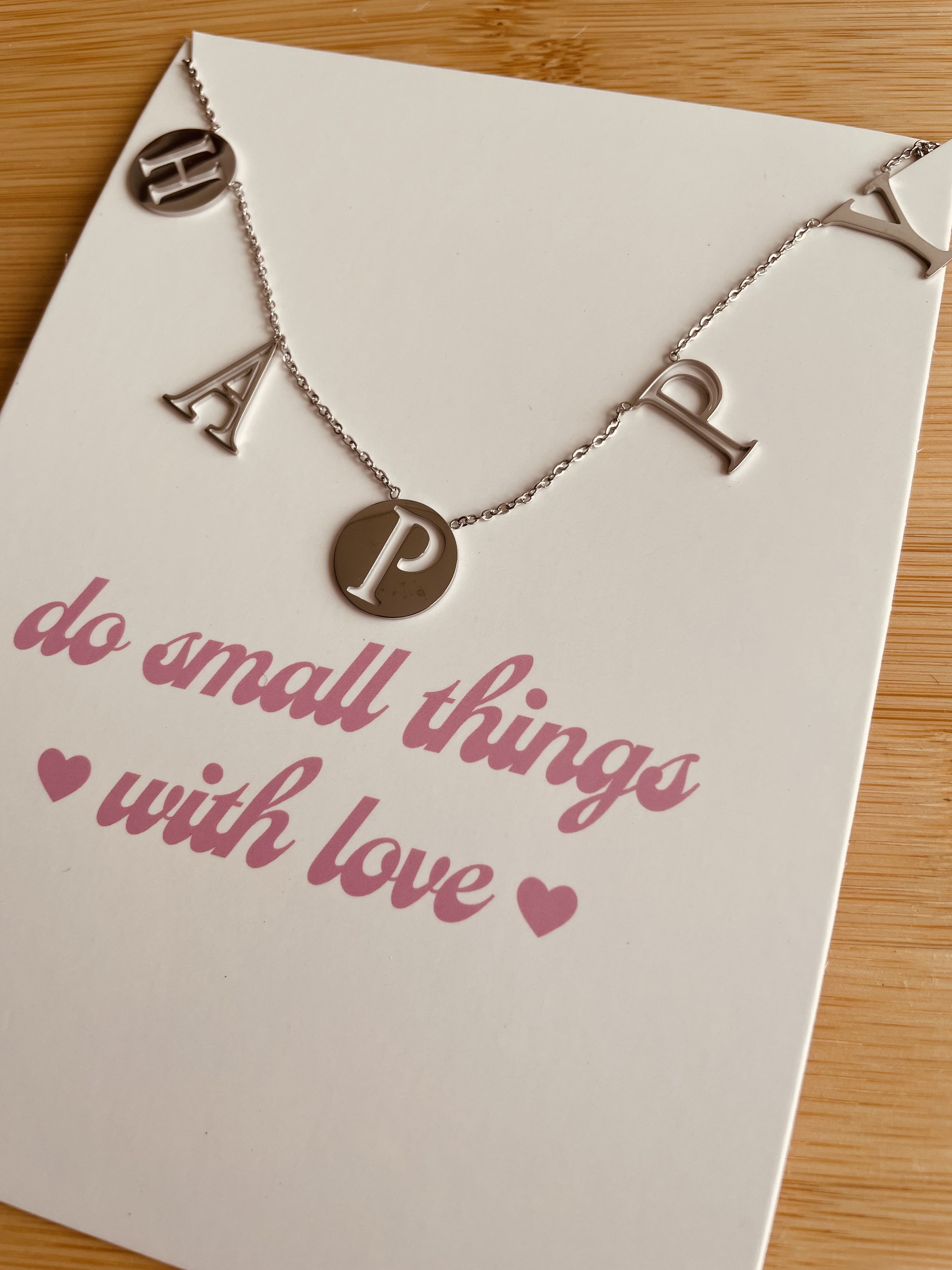 Zilverkleurige ketting | Happy
