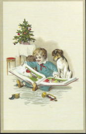 Jongen leest hond kerstverhaal voor prentbriefkaart  {W185}
