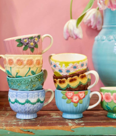 Rice Ceramic Mug with Embossed Mint Flower Design