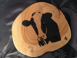 Teak wooden disk painted with cow.