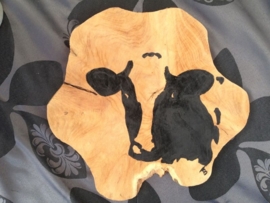 Teak wooden disk painted with cow.