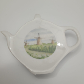 Theetip met afbeelding landschap molens