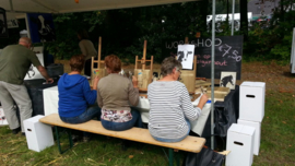 Schilderen op steigerhout fair / festival workshop