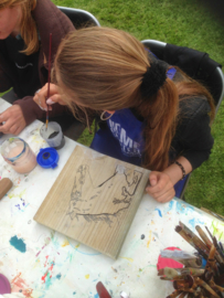 Schilderen op steigerhout fair / festival workshop