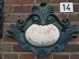 Restauratie gietijzer naambord met koe