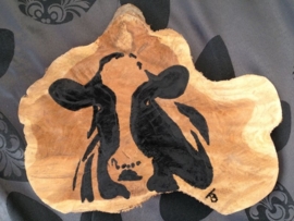 Houtenschijf beschilderd met koe