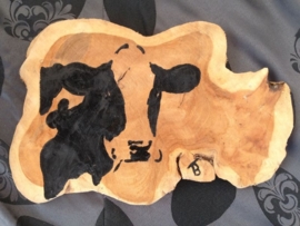 Teak wooden disk painted with cow.