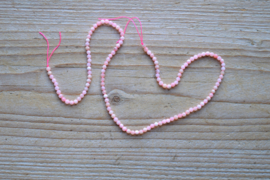 Peruviaans roze opaal gefacetteerde ronde kralen ca. 3 mm (seedbeads)