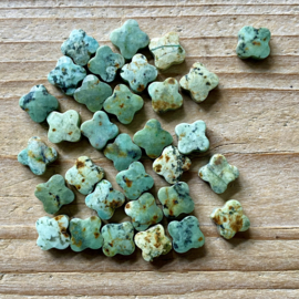 Afrikaans turquoise gefacetteerde klavertjes ca. 10 mm per stuk