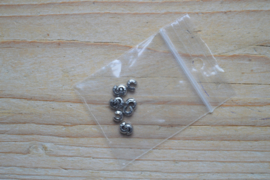 Metalen knijpkraalverbergers RVS  ca. 4 mm 10 stuks