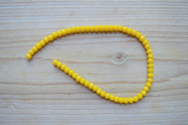 Kristalstreng geel gefacetteerde rondellen ca. 4 x 6 mm