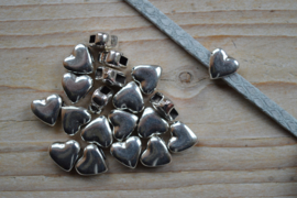 Metalen leerschuif hart ca. 11 x 12 mm per stuk