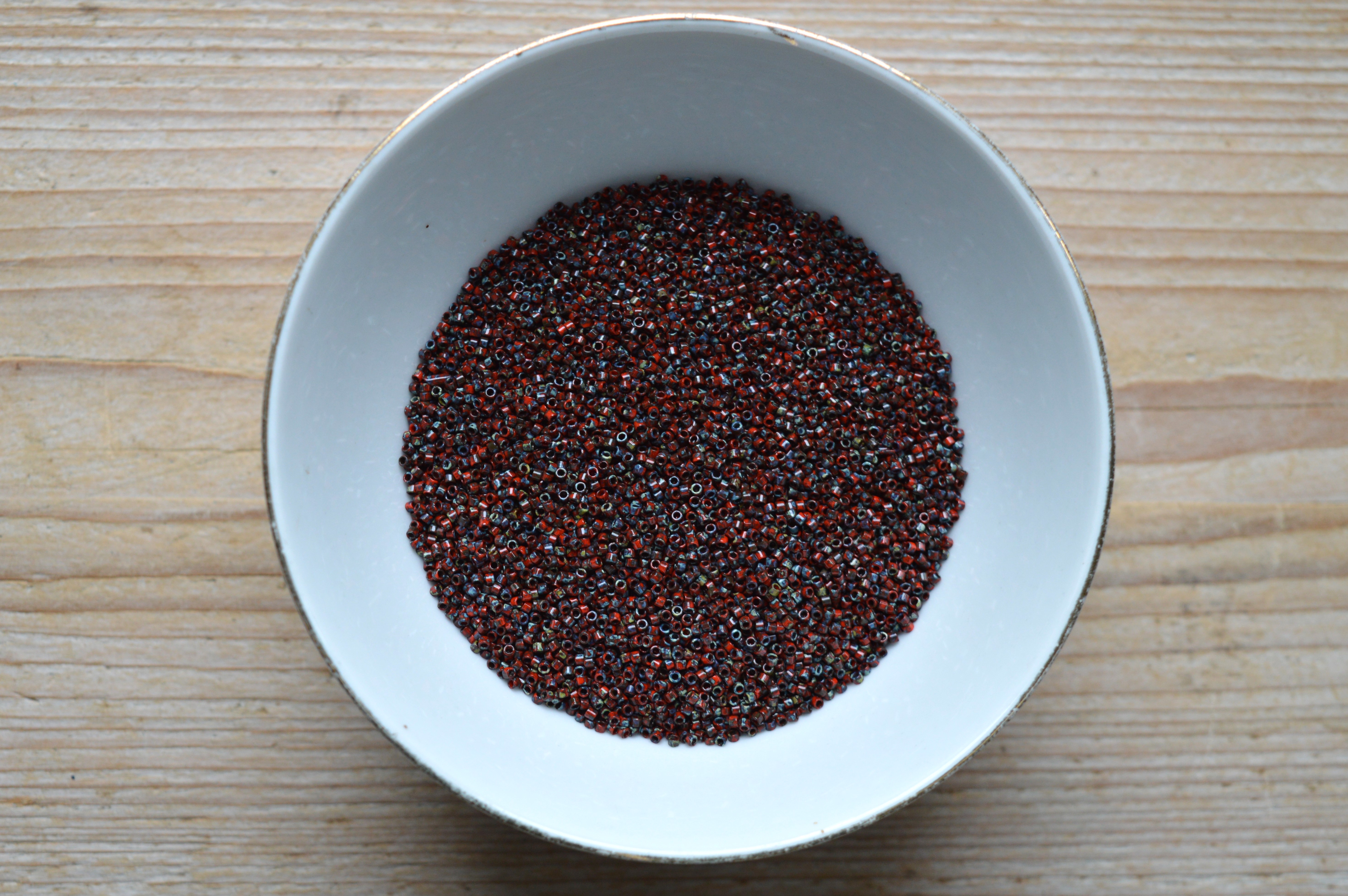 Miyuki Delica’s 11-2263 Opaque Picasso Red (per 5 gram)