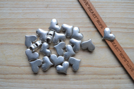 Metalen leerschuif hart 10 mm ca. 14 x 16 mm per stuk