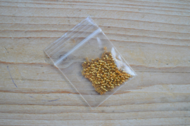 Goudkleurige knijpkralen ca. 2 mm ca. 50 stuks
