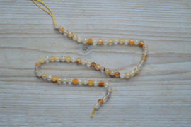 Limonit Quartz/Golden Healer facettierte runde Perlen ca. 6 mm